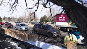 cars lining up at a mobile food pantry
