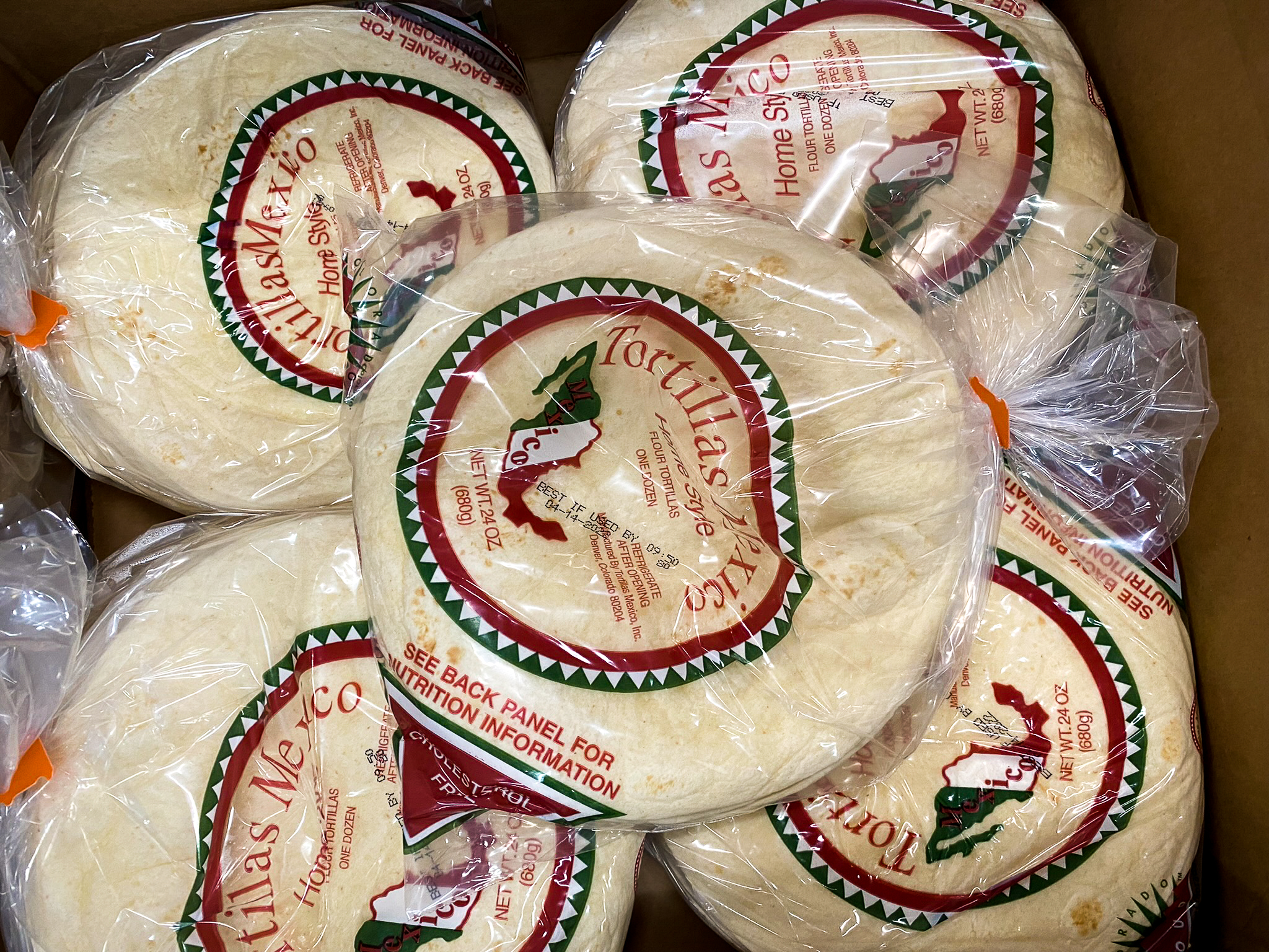 a box of bagged tortillas