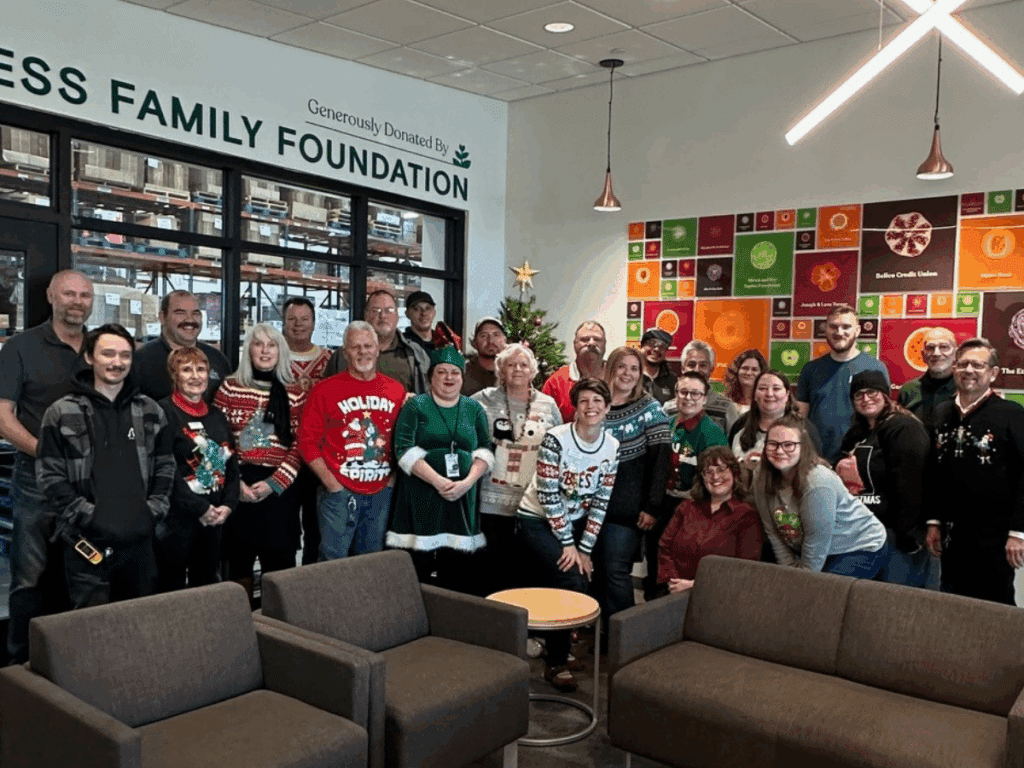 Western Slope staff posing in Christmas sweaters