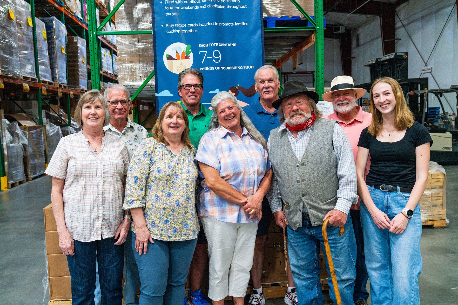 Wednesday volunteers posting inside warehouse.