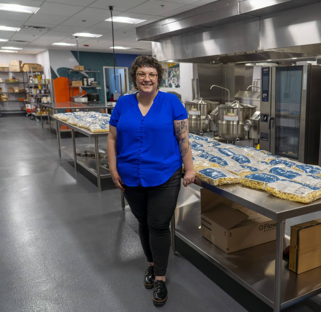 Kodi Phelps posing in kitchen
