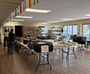 food set our on tables and shelved at the Good Shepard food pantry