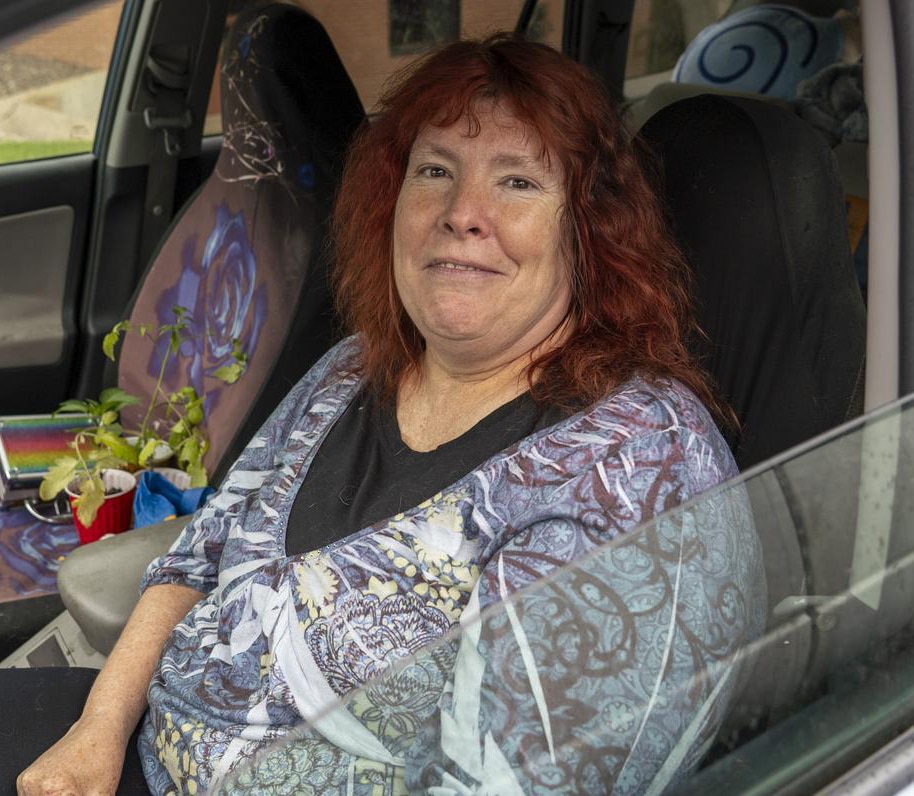 A woman in her car at a mobile pantry in Colorado.