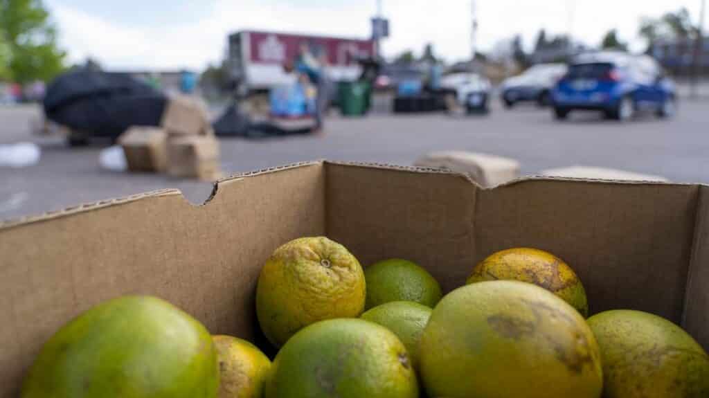 a large box of produce outside at the Hinkley High School mobile pantry
