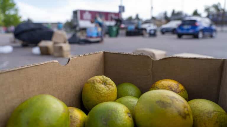 a large box of produce outside at the Hinkley High School mobile pantry