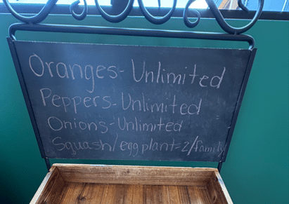 sign offering free produce
