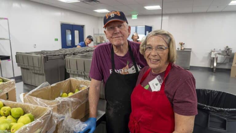 Posed photos of volunteers in the Denver distribution center.