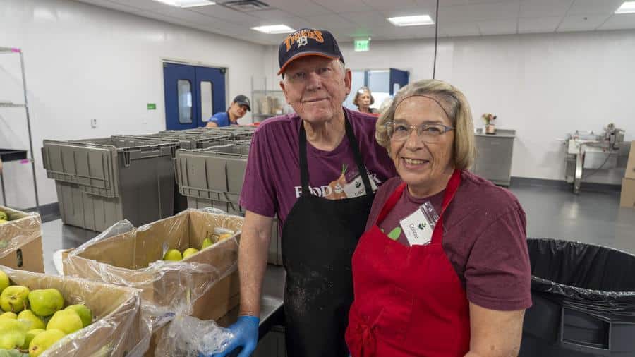 Posed photos of volunteers in the Denver distribution center.